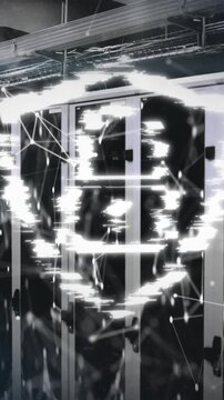 Animation of padlock in shield over connected dots forming geometric shapes on data server racks
