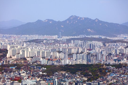 Seoul cityscape in South Korea. City landscape of Seongbuk district (Seongbuk-gu) and Nowon district (Nowon-gu). Suraksan mountain in background.