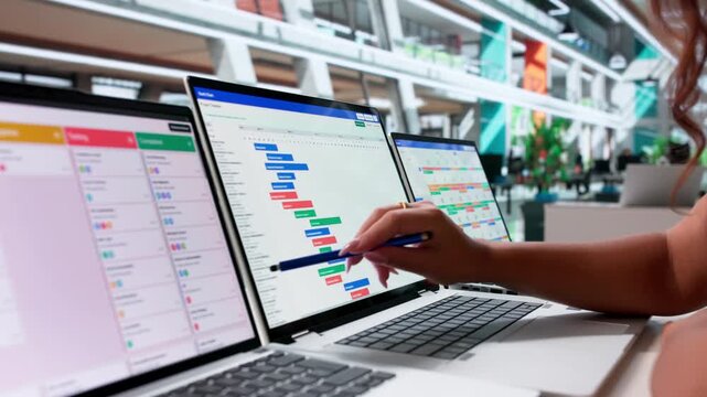 Project Manager Updates Agile Task List In Office Diary