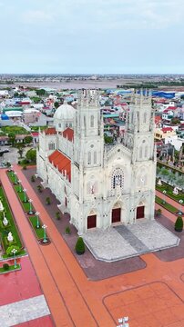 Aerial View of Kien Lao Parish Church in Xuan Truong, Nam Dinh, Vietnam, Showcasing Catholic Architecture and Surrounding Countryside