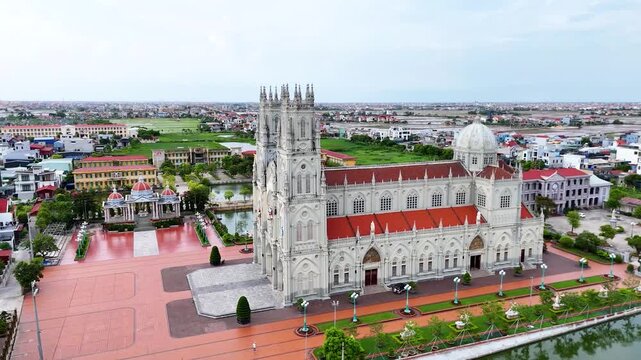 Aerial View of Kien Lao Parish Church in Xuan Truong, Nam Dinh, Vietnam, Showcasing Catholic Architecture and Surrounding Countryside