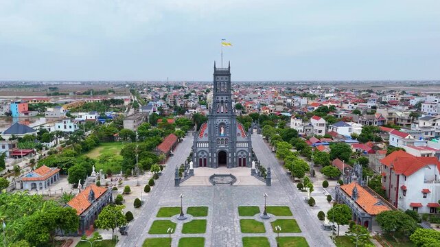 Drone Footage of Sa Chau Church in Giao Thuy, Nam Dinh, Vietnam, Highlighting the Historic Catholic Landmark and Surrounding Rural Landscape