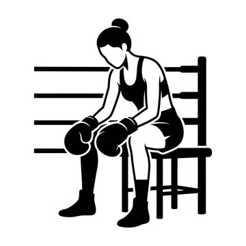 Female boxer sitting on chair with gloves