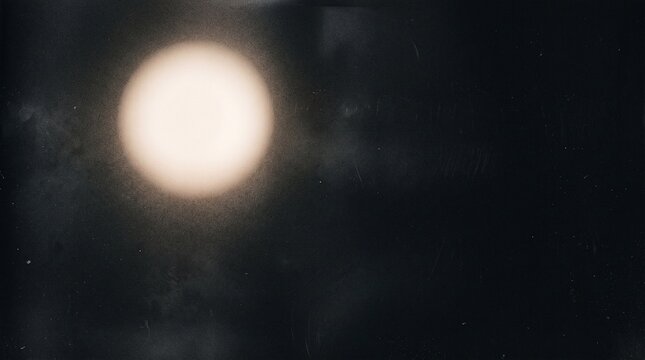 Abstract dark film grain texture with a glowing circular light leak effect creating a moody cinematic retro aesthetic background
