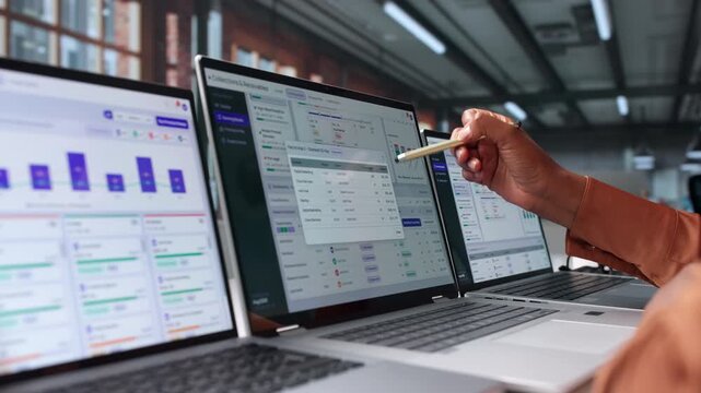 Accounts Manager Reviews Overdue Invoices On Laptop