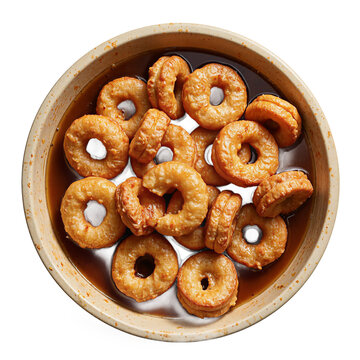 Torrejas rum syrup bowl cut out on a transparent background featuring traditional cuban sweets in a ceramic dish