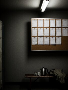 Break room with schedule board and coffee station
