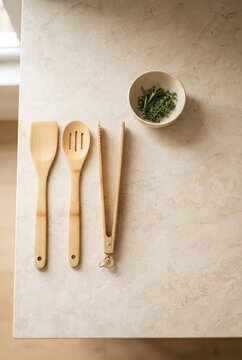 Bamboo Kitchen Utensils on Marble Countertop, Sustainable Cooking and Healthy Lifestyle Concept