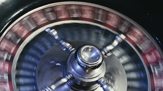Close-up View of an Elegant Casino Roulette Wheel Spinning with Ball