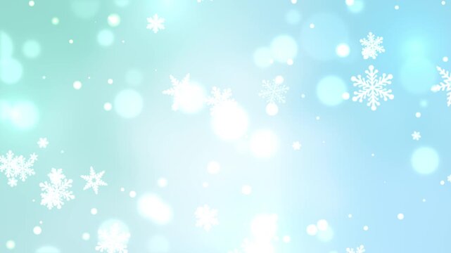 大きな雪の結晶と光の粒子が降るスカイブルーとミントグリーンのシームレスループ動画素材
