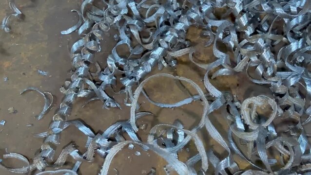 Conical spiral iron chips,surface and texture of from drilling hardless meta
