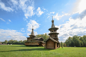 Fototapeta premium Bell Tower and Spaso-Zashiverskaya Church built of wood without a single nail in 1600 in Siberia, Russia