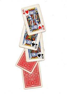 A hand of vintage playing cards isolated on a white background.