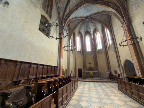 Wooden choir stalls facing the altar beneath the Gothic vault of Saint Mary abbey, Gers, Boulor, France