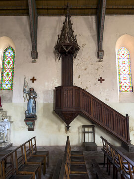 Carved wooden pulpit and staircase inside the Church of Saint James the Greater, Gers, Tilliac, France