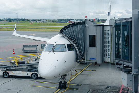 August 15, 2026, Stavanger, Norway - Finnair airplane connected to a jet bridge at Stavanger Airport