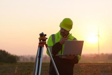 Fototapeta premium Civil engineers inspect wind farms, power generation systems, natural industry and environmental concepts, clean energy