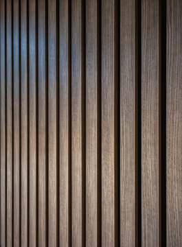 Brown Wooden Planks on a Black Wall.