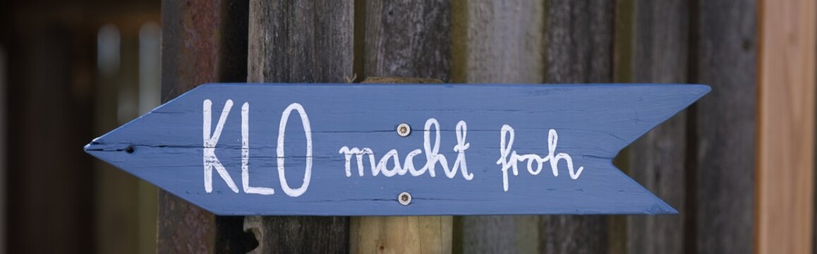 Klo macht froh Schild