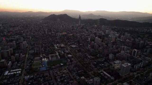 Elevated Drone View Of Santiago Skyline At Twilight, Chile