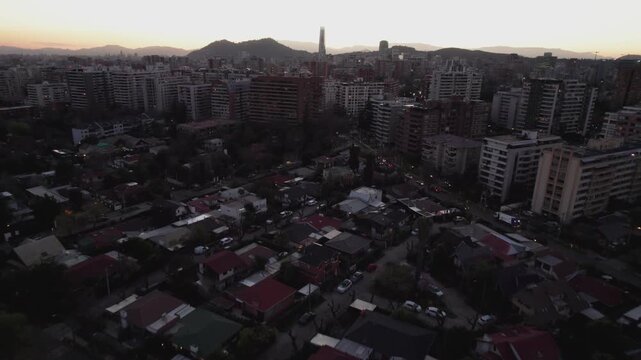 Aerial Drone Rise Over Santiago de Chile Towards City Center At Sunset