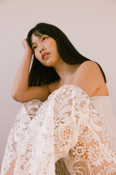 Seated Portrait in Lace Trousers