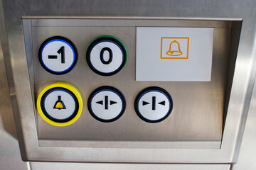Elevator Control Panel with Floor Buttons and Emergency Call Bell Icon © BartLoveyou