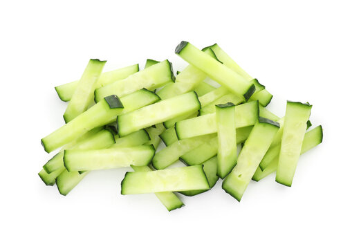 Pieces of fresh cucumbers isolated on white, top view