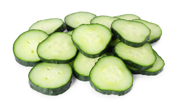 Pieces of fresh cucumbers isolated on white