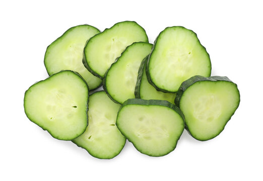 Pieces of fresh cucumbers isolated on white, top view