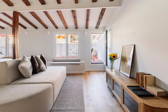 Attic lounge with wooden beams