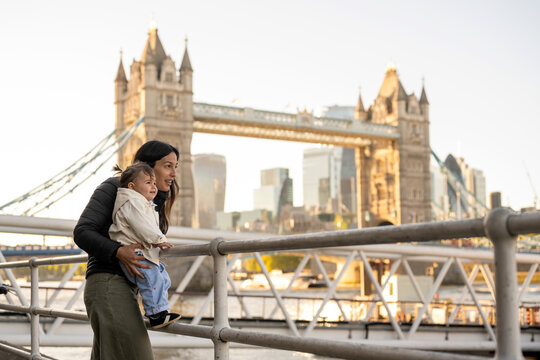 Mother And Baby Enjoying Tower Bridge View