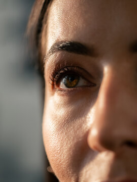 Closeup View of a Woman's Eye Focused on Details in Sunlight