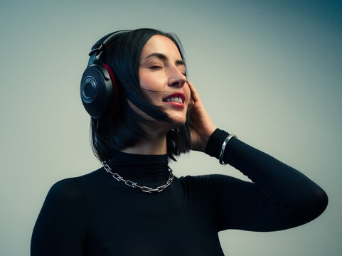 Woman enjoying music in headphones