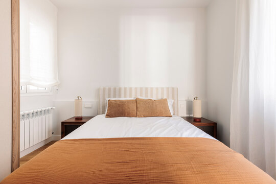 Symmetrical bedroom layout with bed