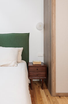 Minimalist wardrobe and bed corner