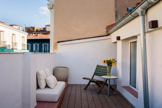 Sunny rooftop terrace lounge area