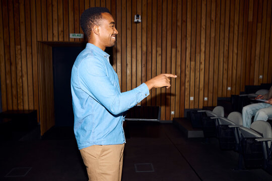 Young man is speaking to the audience