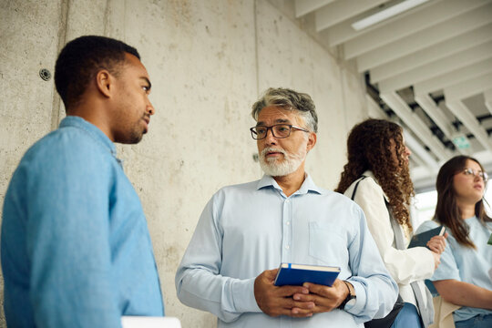 University professor talks to his assistant