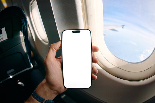 Holding a phone in airplane