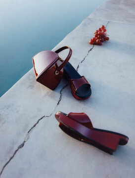 Red Patent Sandals and Handbag by Pool