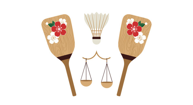 Traditional japanese hagoita wooden paddles decorated with flowers and shuttlecock for playing traditional new year game.