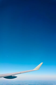 View from airplane towards blue sky