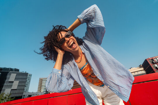 Happy woman with curly hair 