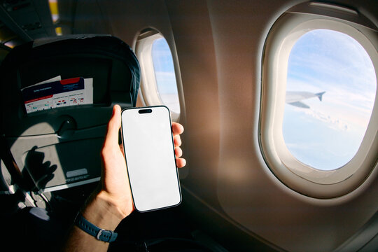 Holding a phone in airplane
