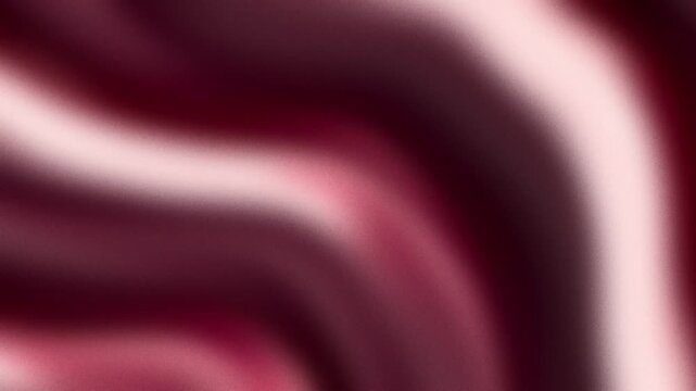 Abstract deep maroon red and soft light pink waves blending together in a fluid motion create an aesthetic sense of luxury velvet fabric texture that flows across the space in a dreamy fashion