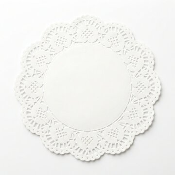 White paper doily with intricate lace pattern isolated on white background