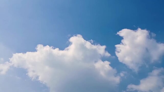 Timelapse of Moving Clouds Across a Blue Sky