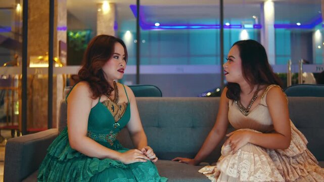 Awkward Conversation Between Two Women on Lobby Couch