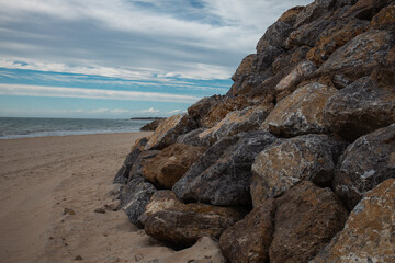 Rocky coastline and sandy beach by the atlantic ocean in Spain © Oksana